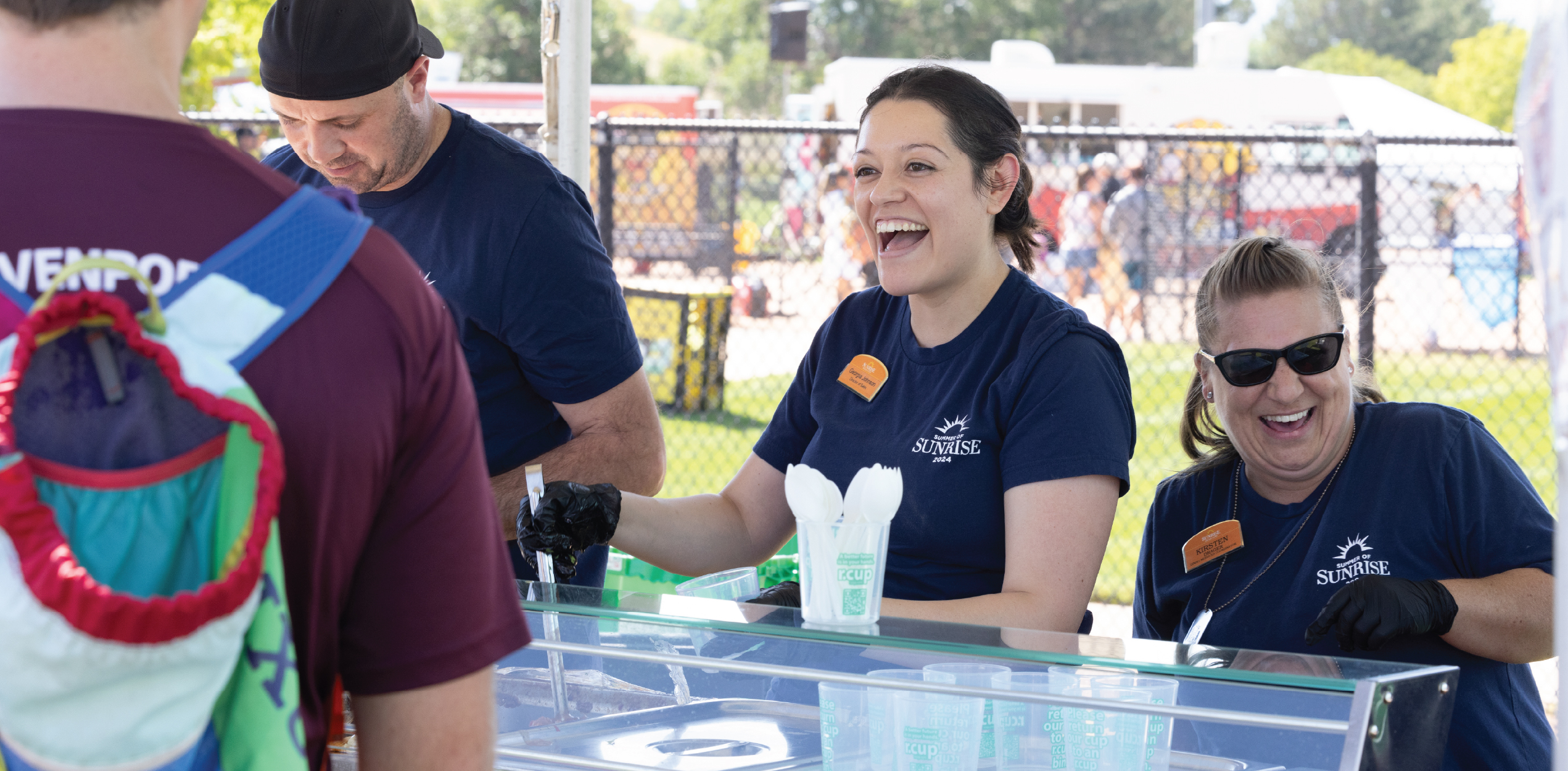Group of people serving Chili during the festival.