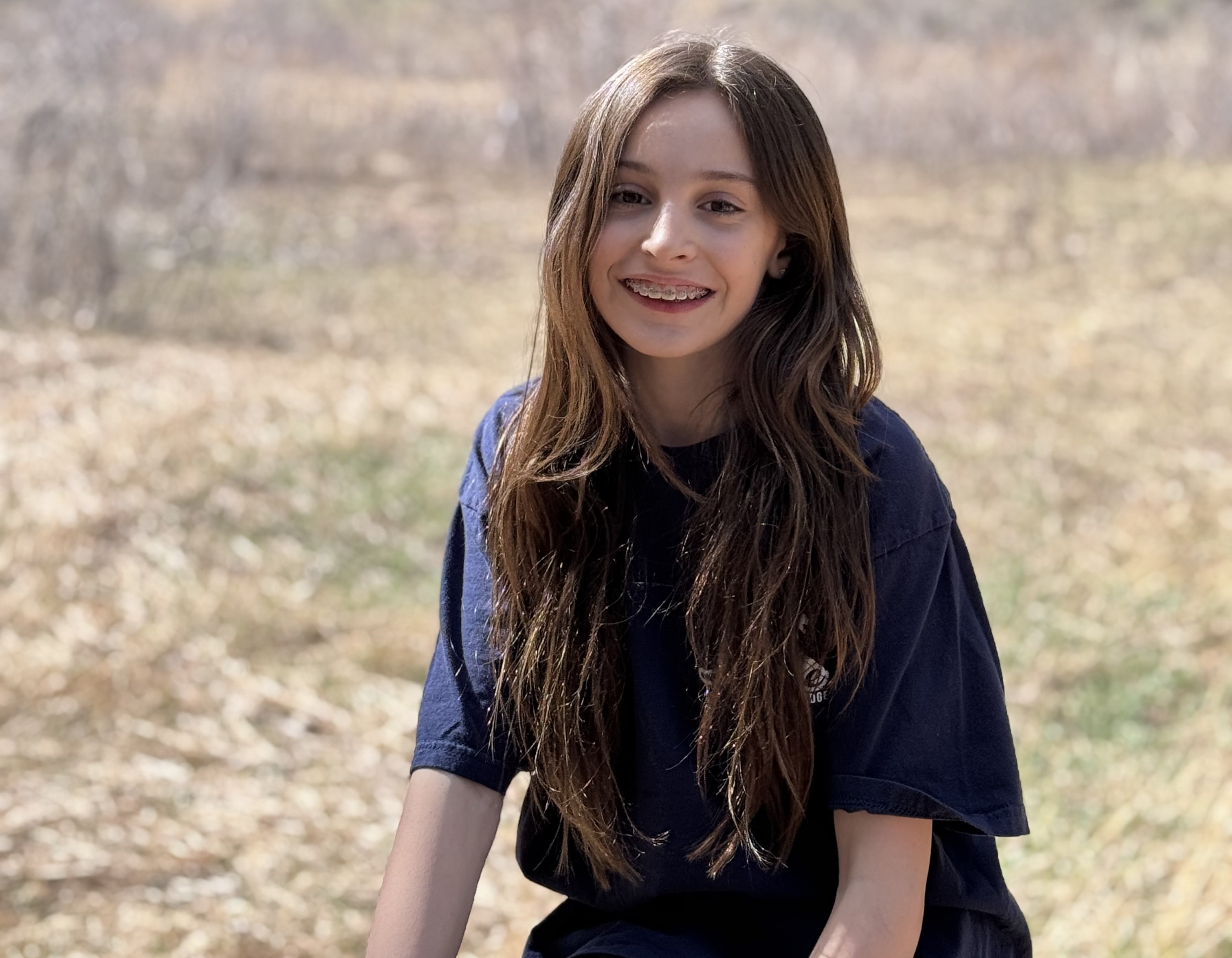 Image of Scarlett Thompson out in nature.