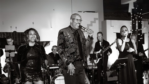Montage trio performing at an event