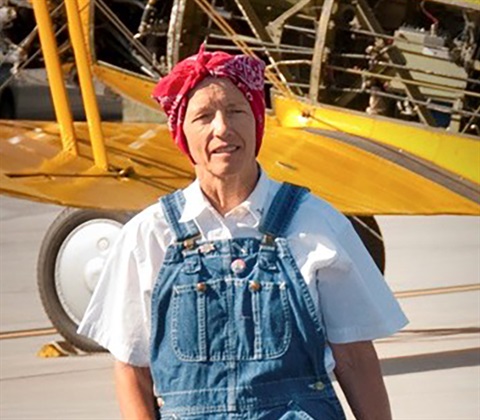 Gail Beaton dressed in character as Colorado's Rosie the Riveter.