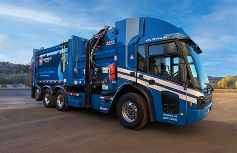Republic Services EV waste collection truck parked in a cul-de-sac