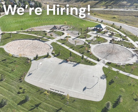 We're hiring text overlaying a drone photo of Wildflower Park.