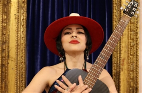 Melissa Ivey holding a guitar.jpg