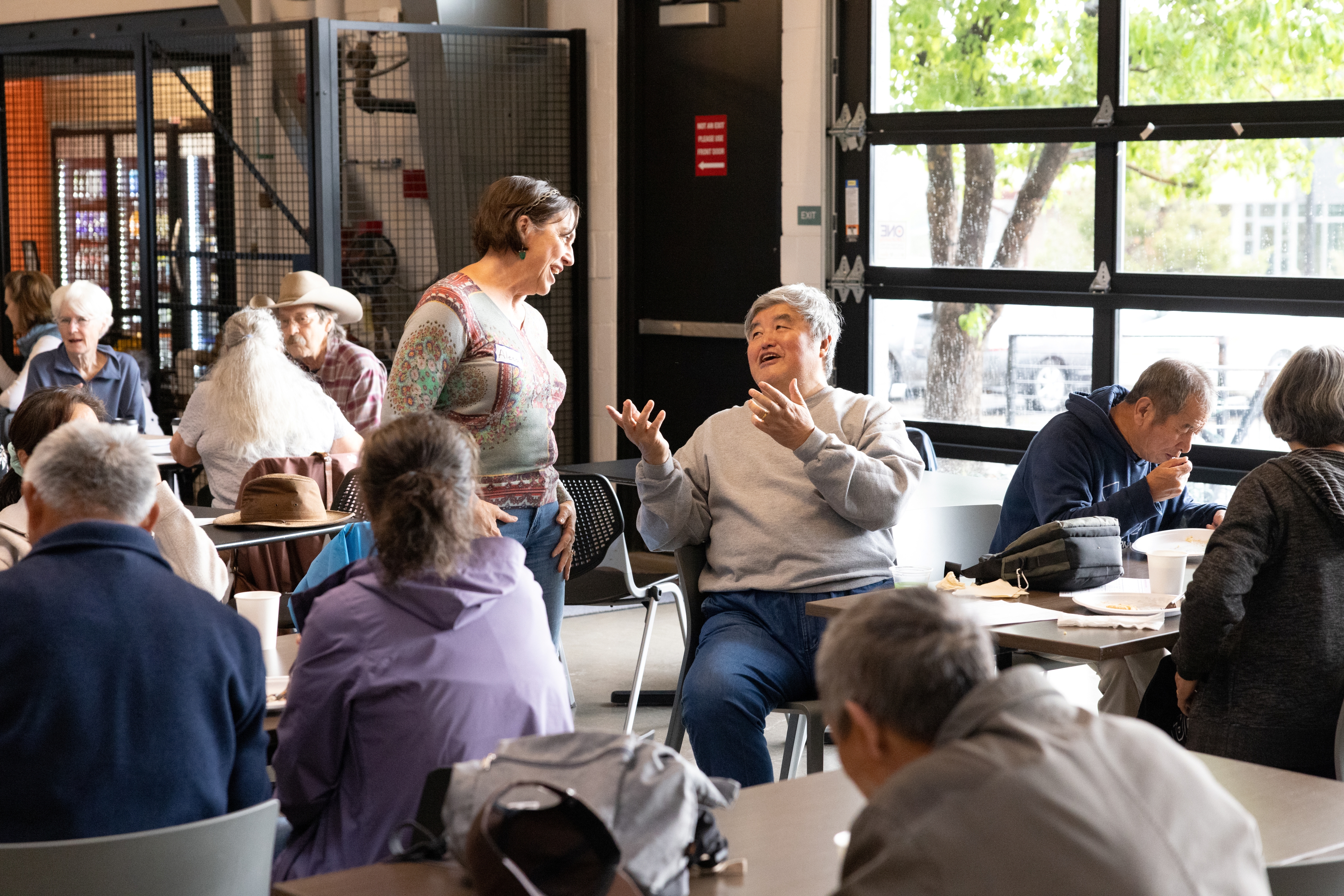 People chatting during the senior breakfast.