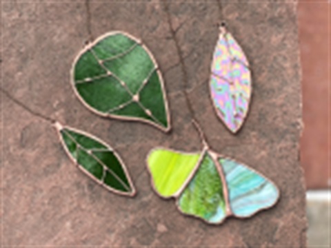 set of leaf/butterfly style suncatchers