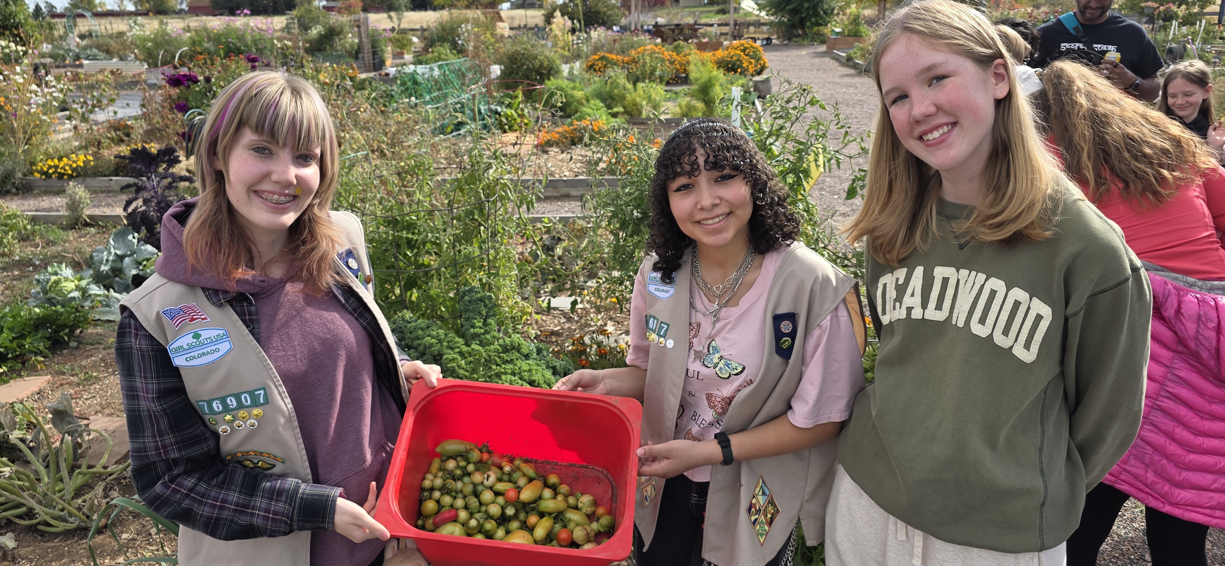 GS Troop 76907 At at a garden with freshly picked produce